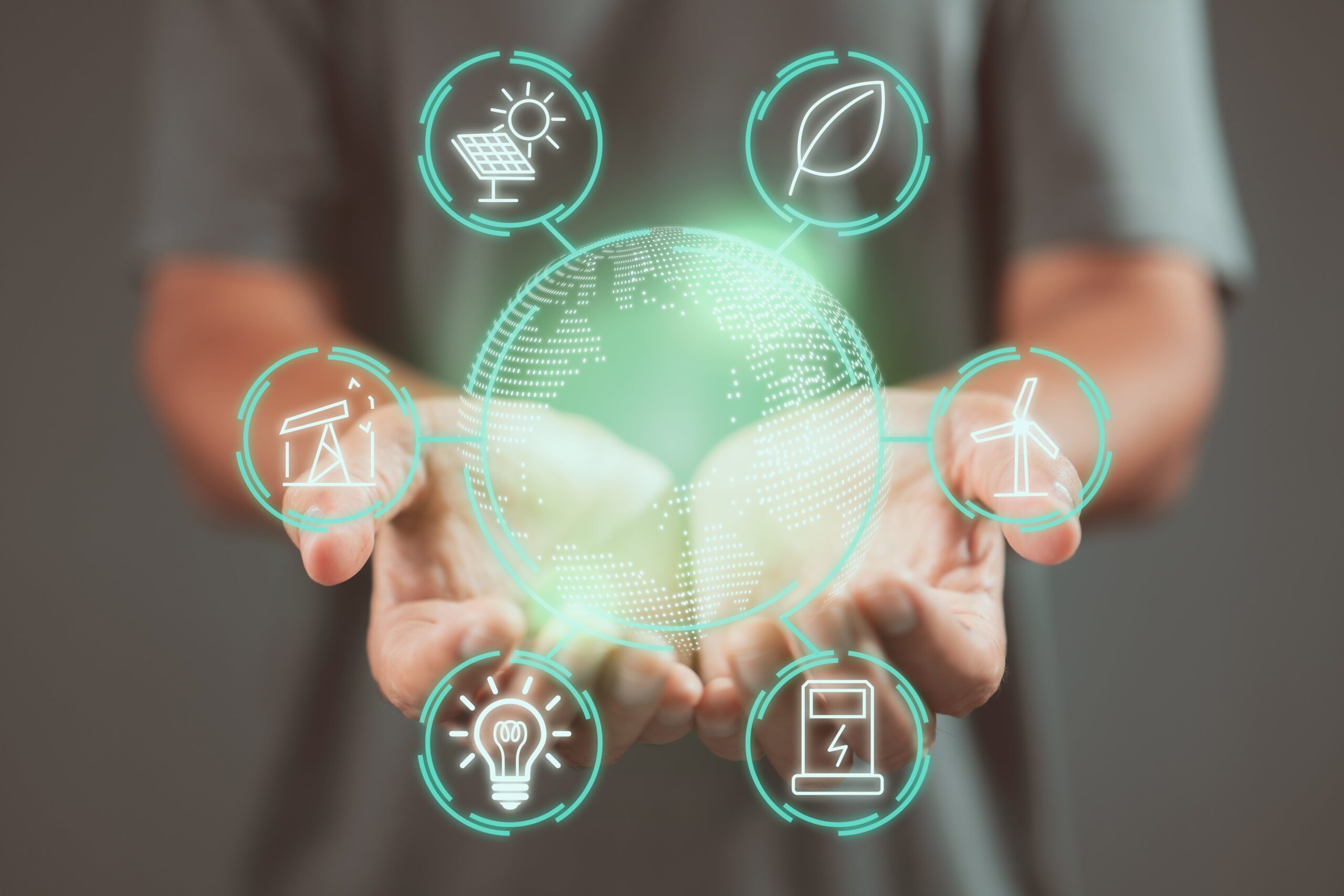 human-hands-holding-earth-with-energy-resources-icon-earth-day-energy-saving-concept-min